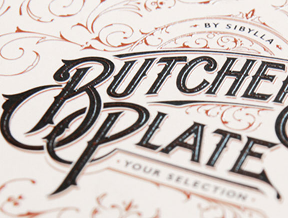 primer logotipa butchers plate na specijalnoj vrsti papira